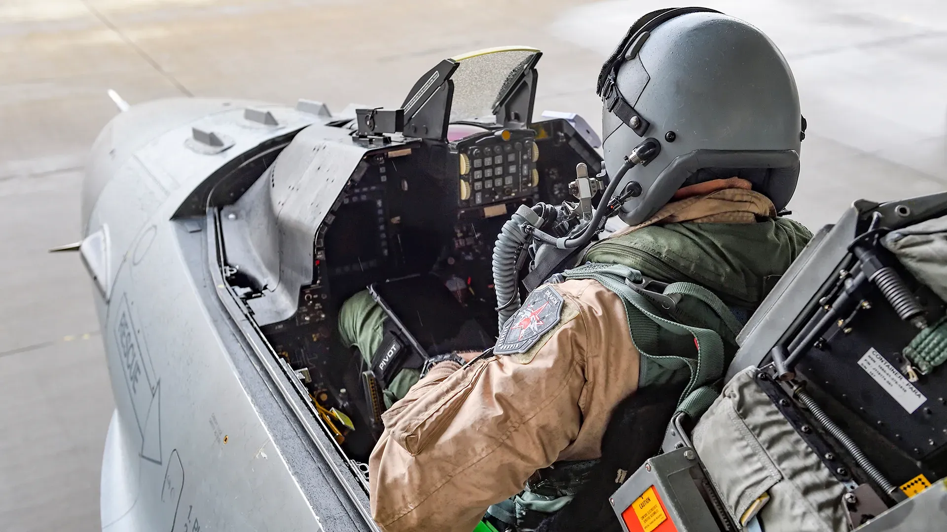 F-16 Fighting Falcon pilot preparing for flight