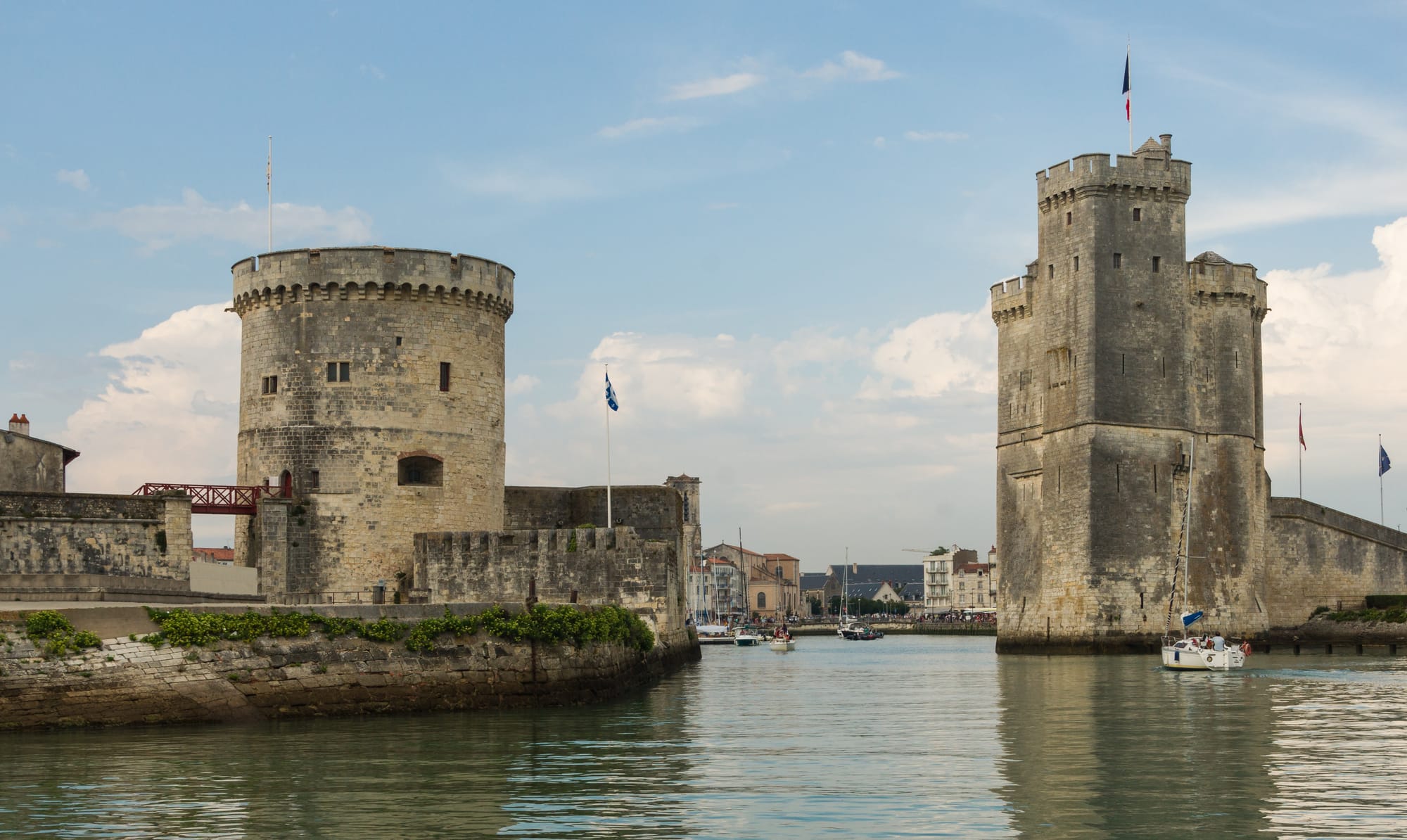 The medieval harbour towers of La Rochelle, France — the Atlantic port where the Knights Templar fleet disappeared after the arrests of October 1307