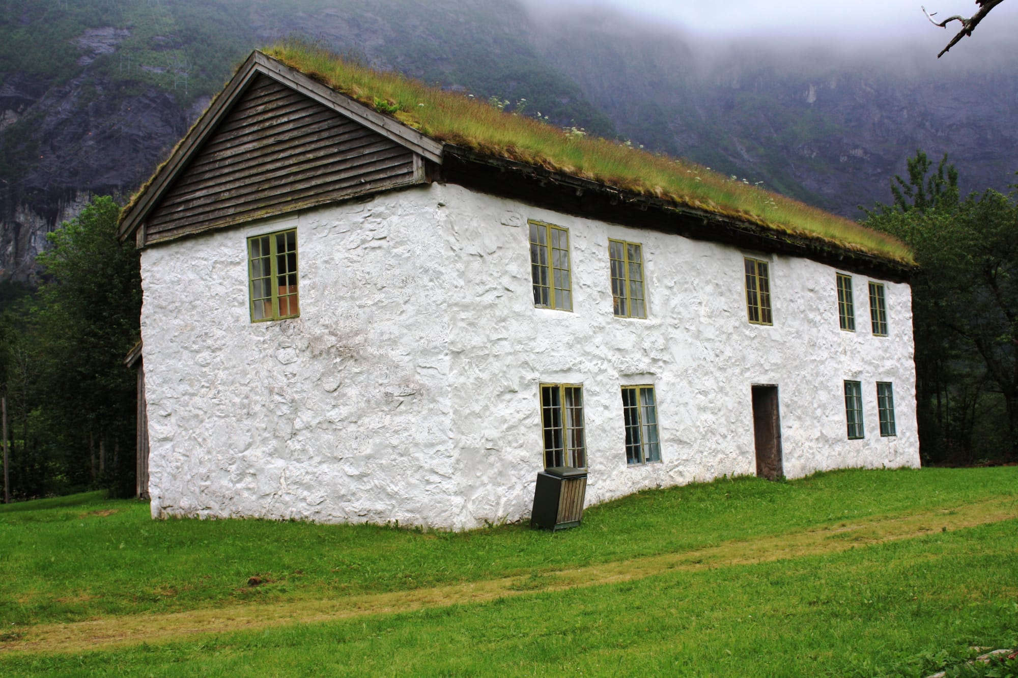 Traditional Norwegian farmhouse in Telemark, the kind of rural community where vardoger accounts were routinely documented in 19th-century folklore collections