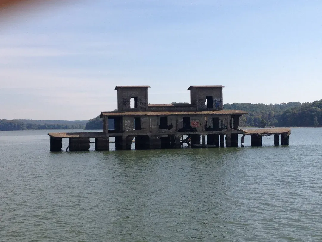 Kentucky Lake, Land Between the Lakes — the man-made lake created by the TVA dam on the Tennessee River, beneath whose waters lie the submerged remains of towns, farms and graves of the displaced Between the Rivers community