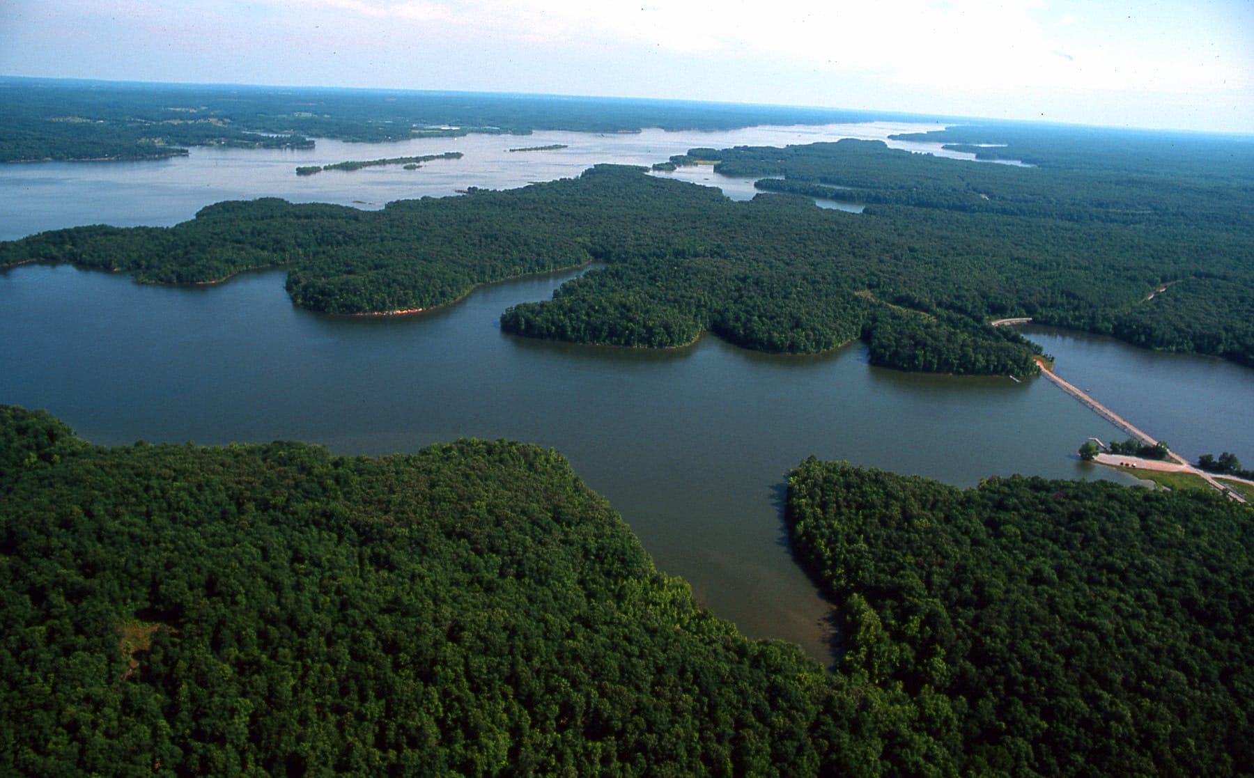Aerial view of the Land Between the Lakes National Recreation Area, Kentucky and Tennessee — 276 square miles of forested peninsula between Kentucky Lake and Lake Barkley, site of creature traditions stretching back more than three centuries