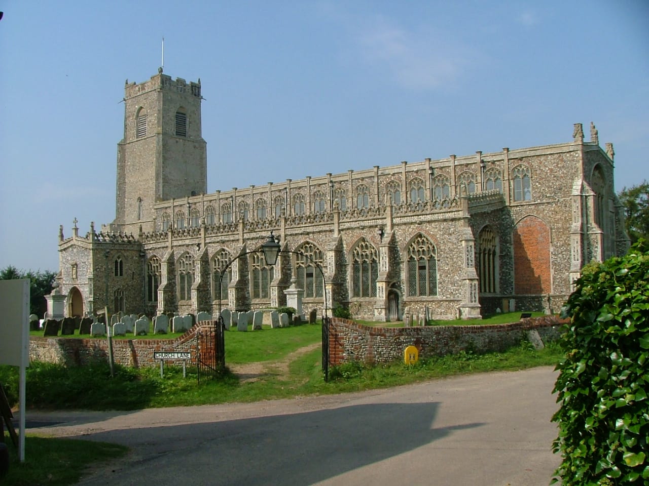 Holy Trinity Church, Blythburgh, Suffolk — known as the Cathedral of the Marshes, site of the most famous Black Shuck incident of August 4th 1577 in which the creature killed two people and left scorch marks on the north door that remain visible today