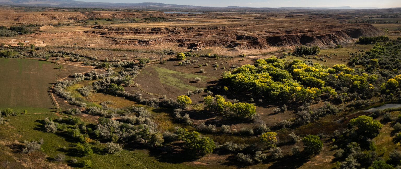 Skinwalker Ridge above the Uintah Basin, Utah — the geographical feature that gives Skinwalker Ranch its name, bordering the Ute tribal reservation on the edge of a landscape with documented anomalous history extending centuries before the Sherman family purchase