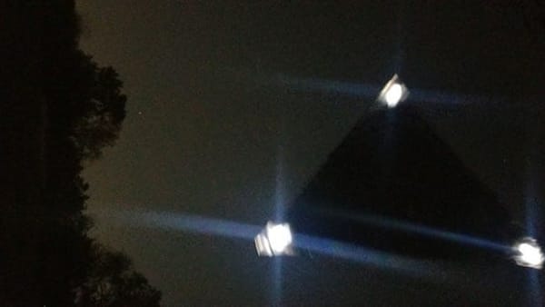 Silent Triangle Craft Hovers Over Car on Mississippi Highway